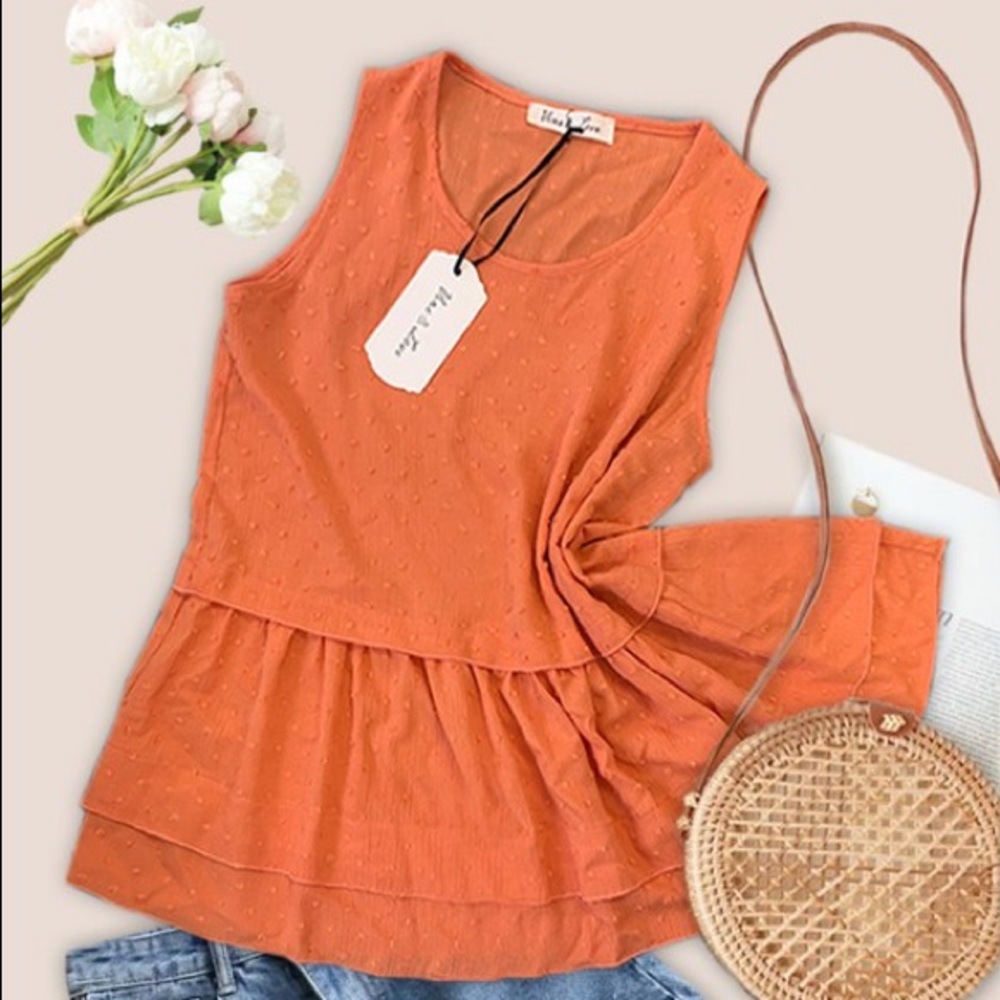 Ruffled sleeveless blouse